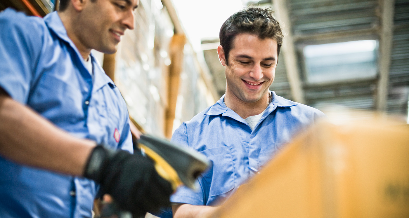 warehouse workers scanning inventory