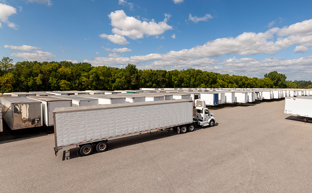 yard of storage trailers